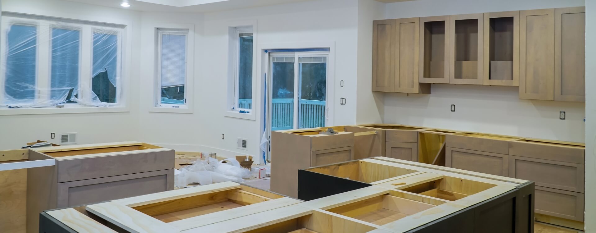 Happy cleaning technicians wiping living room